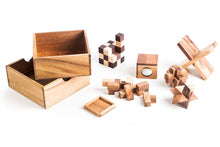 Load image into Gallery viewer, 4 individual brainteaser wooden puzzles in a gift wooden box.