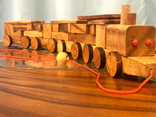 Load image into Gallery viewer, Pull along wooden train with 26 Piece, educational shapes jig-saw wooden toy.