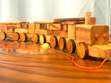 Load image into Gallery viewer, Pull along wooden train with 26 Piece, educational shapes jig-saw wooden toy.