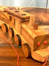 Load image into Gallery viewer, Pull along wooden train with 26 Piece, educational shapes jig-saw wooden toy.