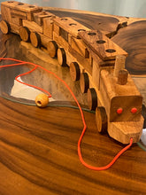 Load image into Gallery viewer, Pull along wooden train with 26 Piece, educational shapes jig-saw wooden toy.