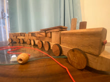 Load image into Gallery viewer, Pull along wooden train with 26 Piece, educational shapes jig-saw wooden toy.