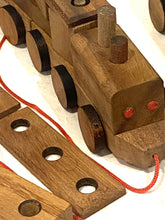 Load image into Gallery viewer, Pull along wooden train with 26 Piece, educational shapes jig-saw wooden toy.