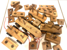 Load image into Gallery viewer, Pull along wooden train with 26 Piece, educational shapes jig-saw wooden toy.