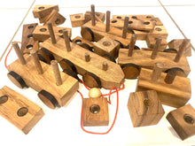 Load image into Gallery viewer, Pull along wooden train with 26 Piece, educational shapes jig-saw wooden toy.