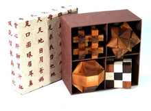 Load image into Gallery viewer, Brainteaser wooden puzzles set of 4 in a gift box.
