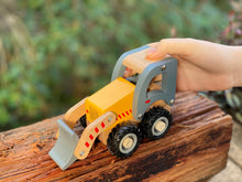 Load image into Gallery viewer, wooden toy Bobcat on piece wood display