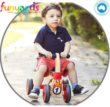 Load image into Gallery viewer, Ride on four wheeled wooden push bike on rubber wheels for toddlers.