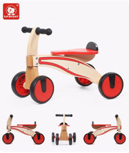 Load image into Gallery viewer, Ride on four wheeled wooden push bike on rubber wheels for toddlers.