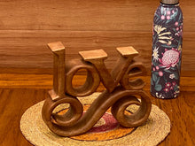 Load image into Gallery viewer, Wooden carved LOVE words decoration 23 cm long with base stand