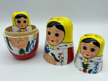 Load image into Gallery viewer, Wooden Nesting Dolls 5 pcs in red and yellow.
