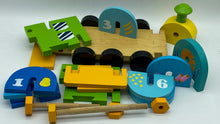Load image into Gallery viewer, Wooden Train Toy with Puzzle Shapes for building and imaginative play
