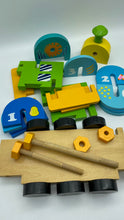 Load image into Gallery viewer, Wooden Train Toy with Puzzle Shapes for building and imaginative play