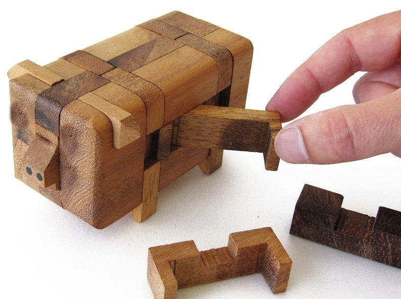 Brainteaser Puzzle Pig animal 3D wooden brain teaser puzzle-take apart and try put all pieces back again.