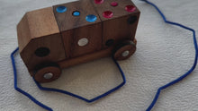 Load and play video in Gallery viewer, Toy wooden pull along pretend play toy truck with dice set
