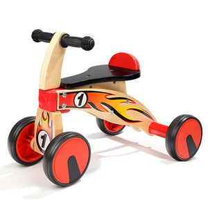 Ride on four wheeled wooden push bike on rubber wheels for toddlers.