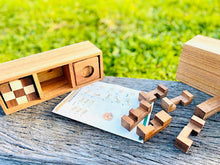 Load image into Gallery viewer, 3 individual brainteaser wooden puzzles in a gift wooden box
