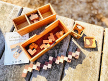 Load image into Gallery viewer, 3 individual brainteaser wooden puzzles in a gift wooden box
