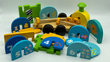 Load image into Gallery viewer, Wooden Train Toy with Puzzle Shapes for building and imaginative play
