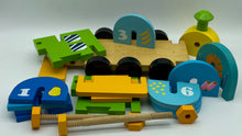 Load image into Gallery viewer, Wooden Train Toy with Puzzle Shapes for building and imaginative play
