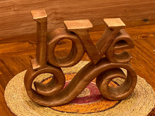 Load image into Gallery viewer, Wooden carved LOVE words decoration 23 cm long with base stand
