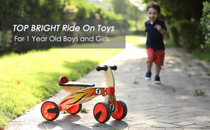 Ride on four wheeled wooden push bike on rubber wheels for toddlers.