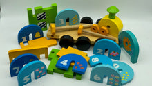 Load image into Gallery viewer, Wooden Train Toy with Puzzle Shapes for building and imaginative play
